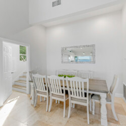 Image of dining area with bay view at Sunrise Bay Florida Short Term Rental in Holmes Beach, Manatee County, Florida